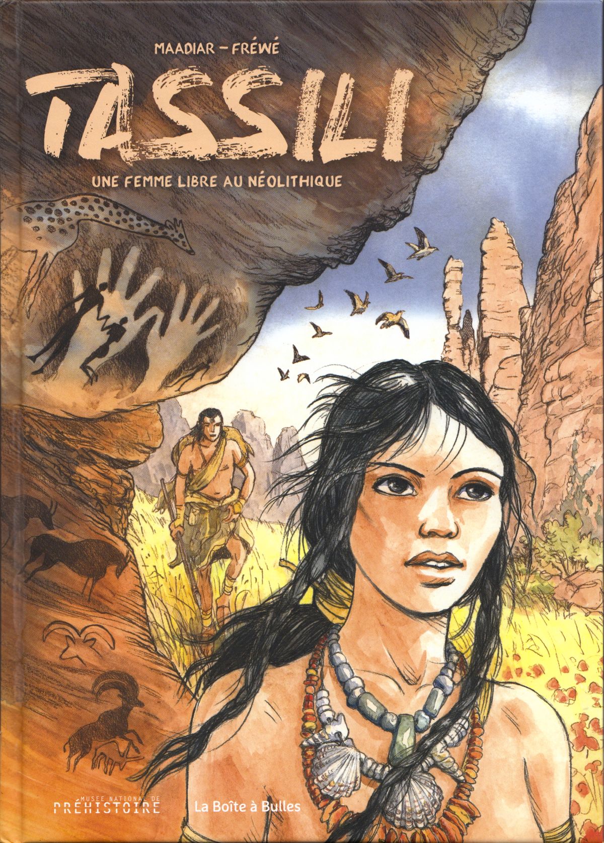 Front cover of the comic book « Tassili, une femme libre au Néolithique » by Maadiar and Fréwé, “premiered” at the Musée national de Préhistoire in Les Eyzies, on the occasion of the lecture given by the researcher Jean-Loïc Le Quellec.